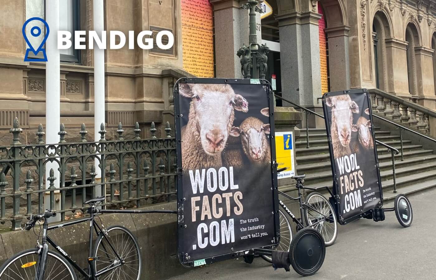 two bicycle billboards with "WoolFacts.com"