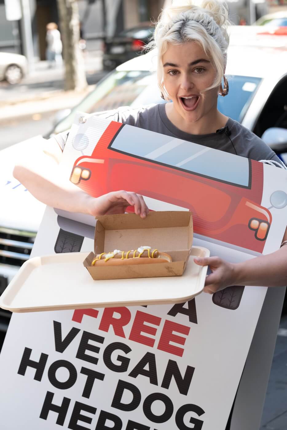 Stefania with a vegan hot dog
