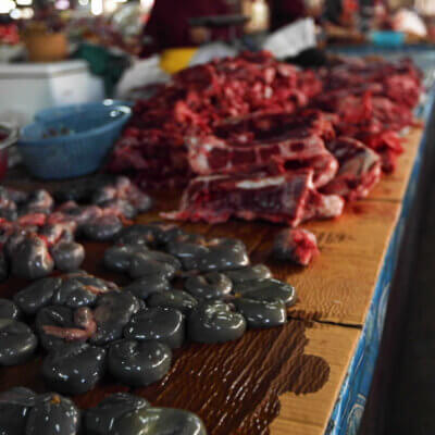 Dead animal body parts at a live animal market.