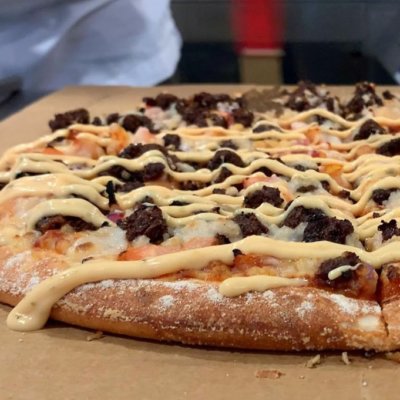 Photo of vegan beef on a Domino's pizza.