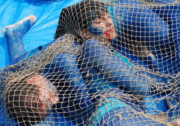 Protesters caught in nets.