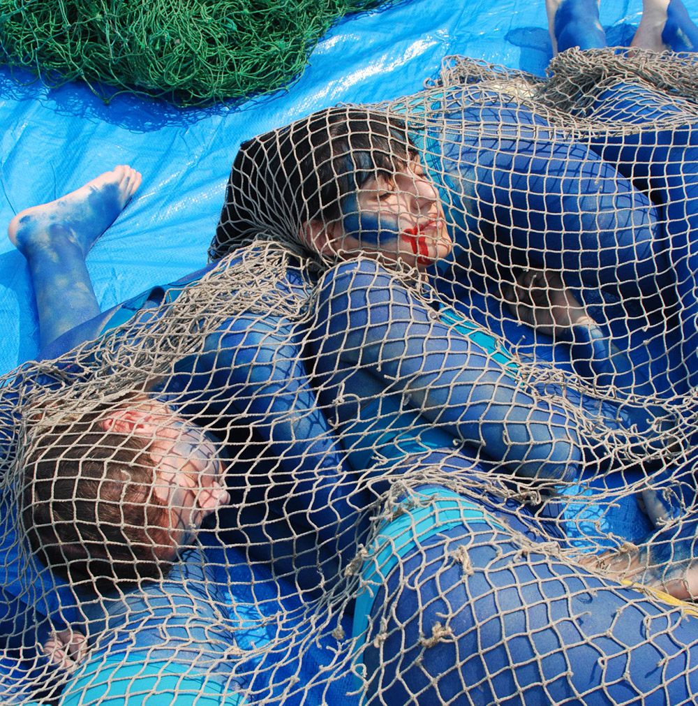 Protesters caught in nets.