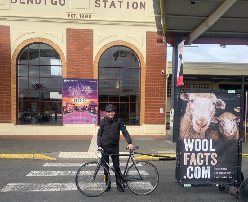 Bicycle billboard with "Wool Facts.com" at Bendigo Station.