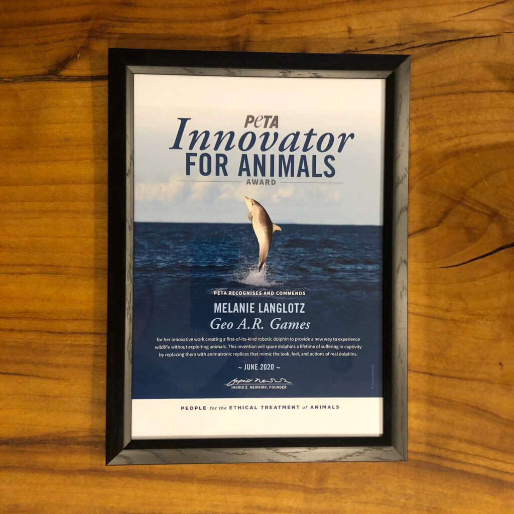 A framed Innovator For Animals Award.
