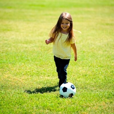 Girl Playing Soccer