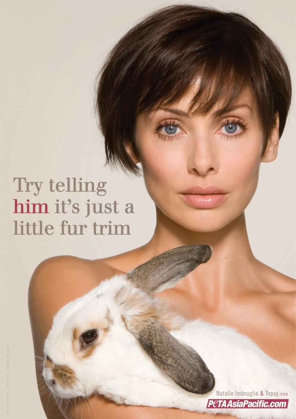 Natalie Imbruglia poses with a rabbit. Text reads: Try telling him its just a little fur trim.