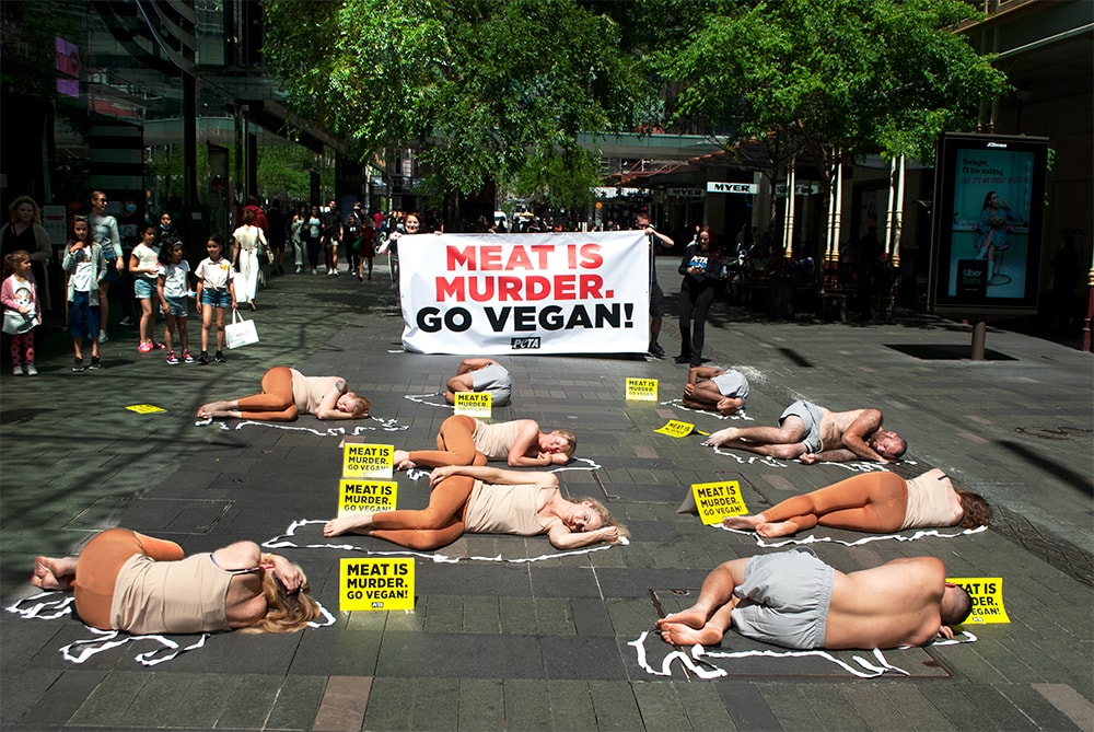 Protesters Lie ‘Dead’ in Meat Industry ‘Crime Scene’