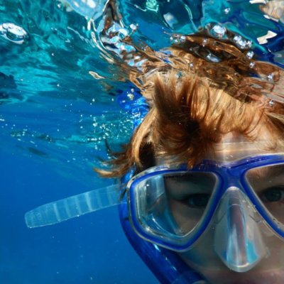A child snorkelling